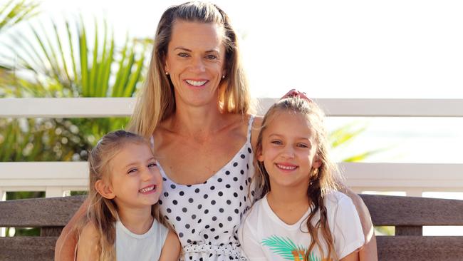 Collaroy mum Kate James and her kids Indy, 4, and Malia, 6. Malia goes to Dee Why Public School. Picture: Tim Hunter.