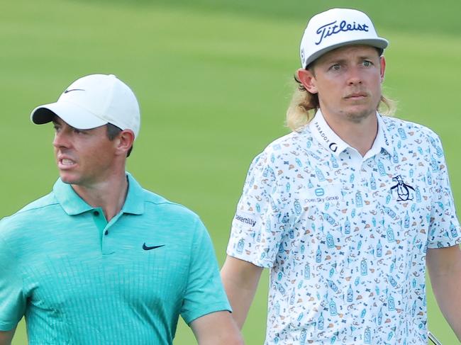 ATLANTA, GEORGIA - AUGUST 26: Cameron Smith of Australia and Rory McIlroy of Northern Ireland walk on the 18th hole during the second round of the TOUR Championship at East Lake Golf Club on August 26, 2022 in Atlanta, Georgia. (Photo by Kevin C. Cox/Getty Images)