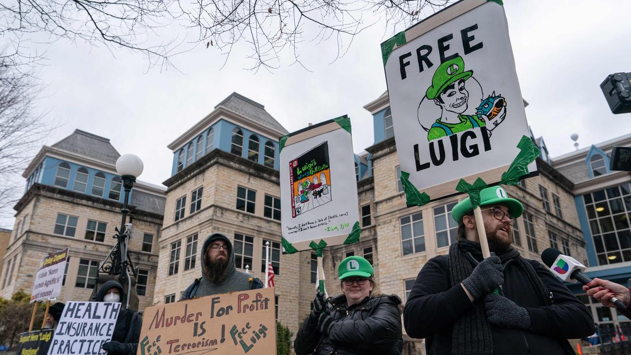 Protesters stand outside the court in Blair County, Hollidaysburg, Pennsylvania. Picture: Adam Gray/AFP