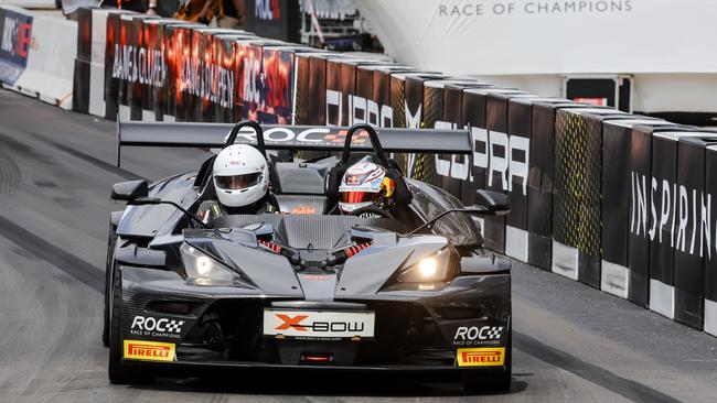 A car drives on the Accor Stadium track for the Race of Champions. Picture: Race of Champions