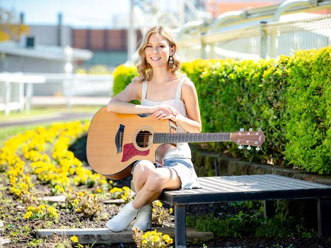 HOLD SATURDAY COURIER MAIL 7TH SEP  Caitlyn Shadbolt poses for a photograph at Doomben Racecourse to promote Country Music Raceday, Monday, September 2, 2019 (AAP Image/Richard Walker)