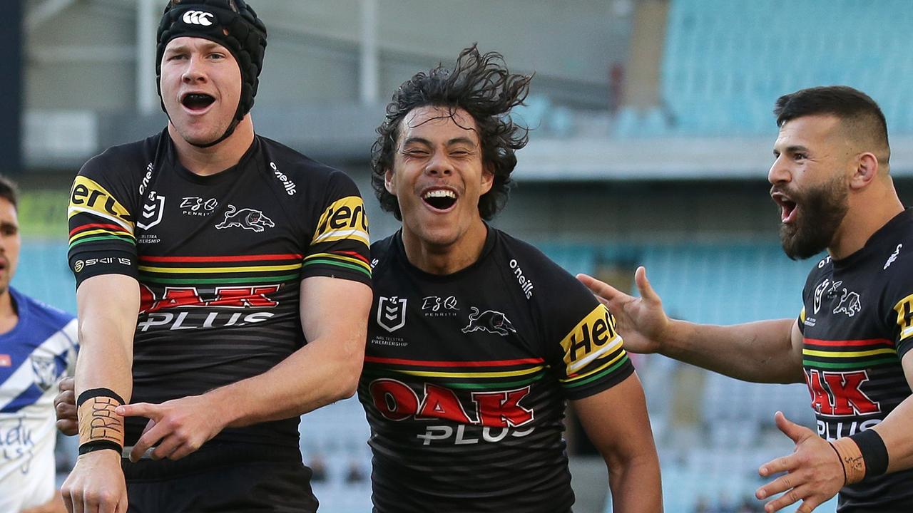 Matt Burton and Jarome Luai celebrate the minor premiership.