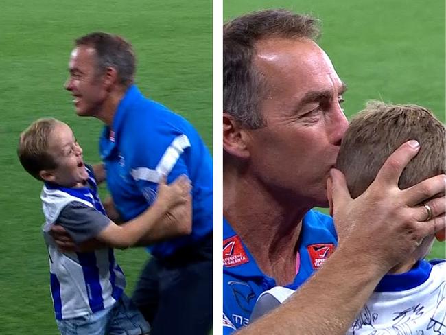 Ollie and Alastair Clarkson hug post-game.