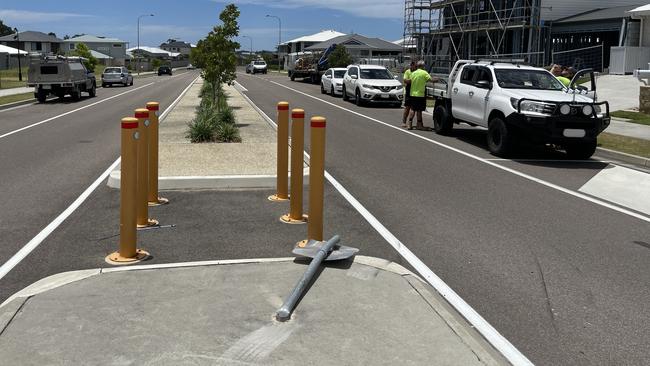 The sign that a car sped through before ploughing into a Pimpama Home. Picture: Georgina Noack