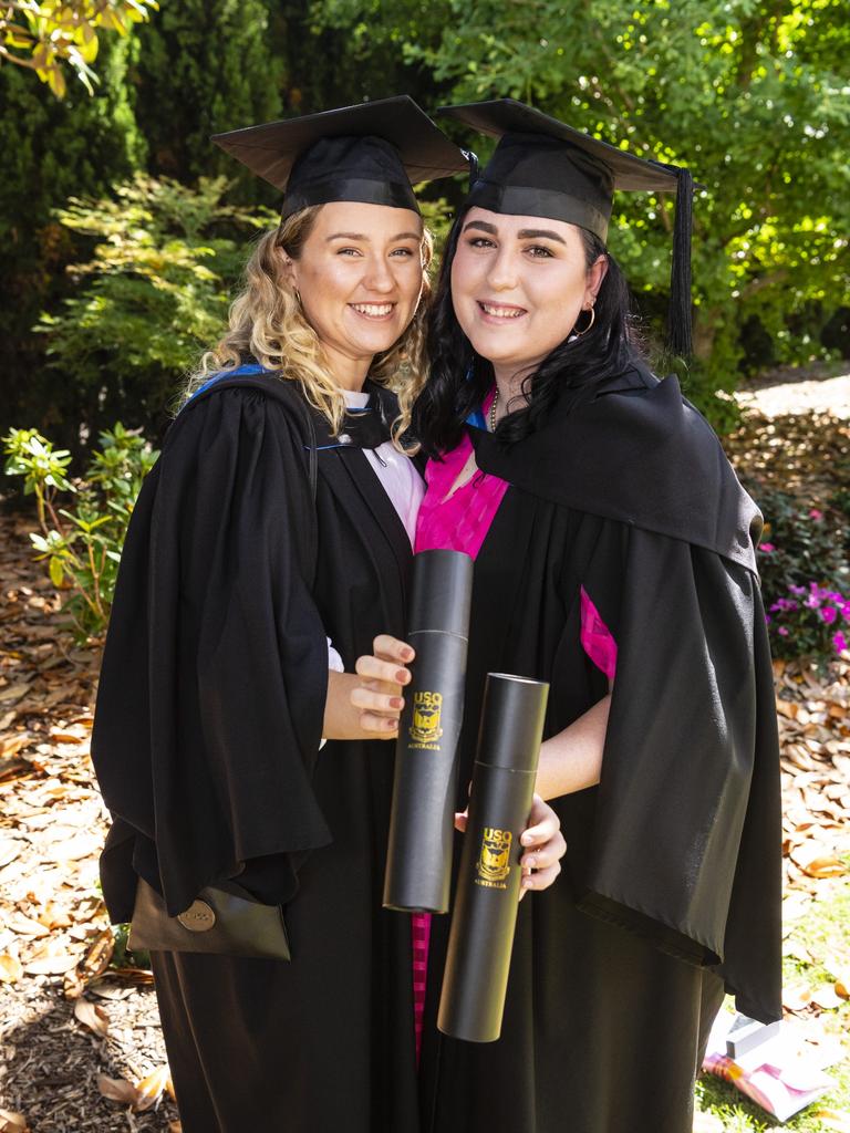 Bachelor of Nursing graduates Eve Campbell (left) and Claudia Austin at the UniSQ graduation ceremony at Empire Theatres, Wednesday, December 14, 2022.