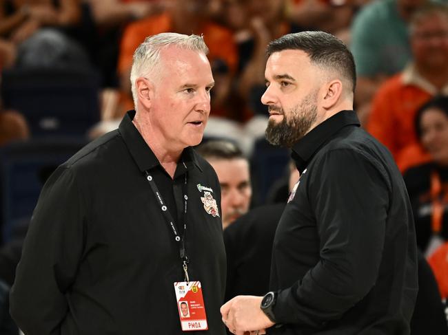 Cairns Taipans CEO Mark Beecroft discusses the situation with Adam Forde. Picture: Emily Barker/Getty Images