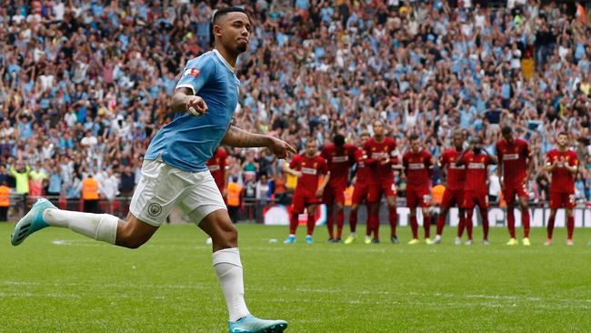 Gabriel Jesus celebrates converting the winning penalty.