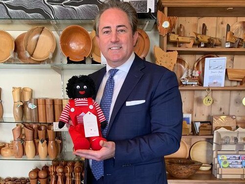 Clarence Alderman Brendan Blomeley with a golliwog at The Woodcraft Shop in Richmond. “Introducing Jack, just like the golliwog Nan made for me,” he wrote on Facebook. Picture: FACEBOOK