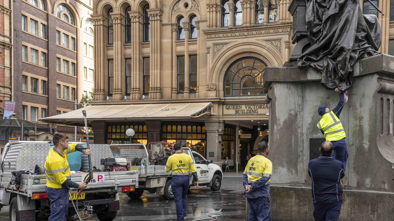 Cleaners pictured working to clean the iconic statue. Picture: NewsWire / Monique Harmer