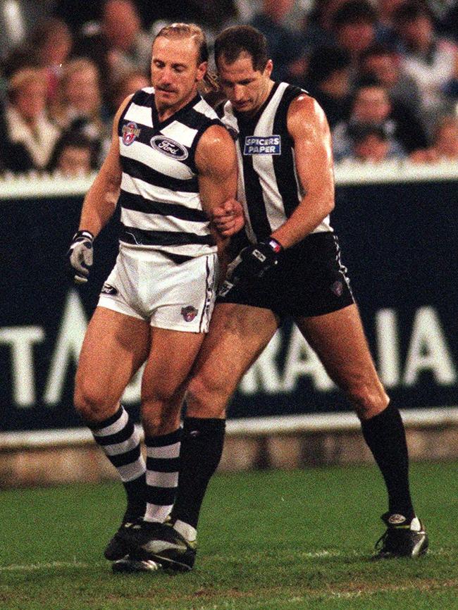 Gary Ablett Snr doesn’t look impressed with Craig Kelly’s on-field tactics.