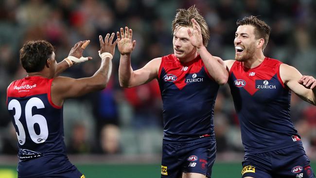 Charlie Spargo celebrates with Kysaiah Pickett and Jack Viney. Picture: Getty Images