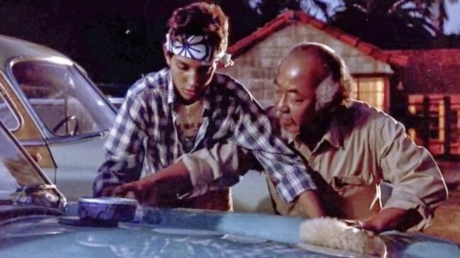 Mr Miyagi and Daniel-san do the ‘wax on, wax off’ in the Karate Kid.