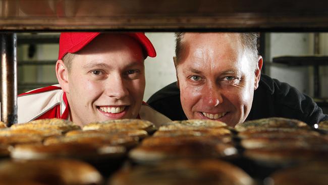 Baker James Kent and owner Tony Greven with a tray of pies at Bakery on O’Connell, North Adelaide.