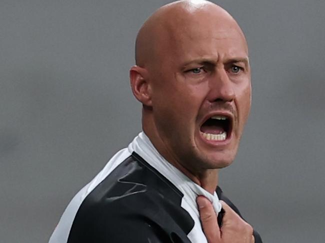 SYDNEY, AUSTRALIA - DECEMBER 14: Roar Head coach Ruben Zadkovich shows his emotion during the round eight A-League Men match between Western Sydney Wanderers and Brisbane Roar at CommBank Stadium, on December 14, 2024, in Sydney, Australia. (Photo by Cameron Spencer/Getty Images)