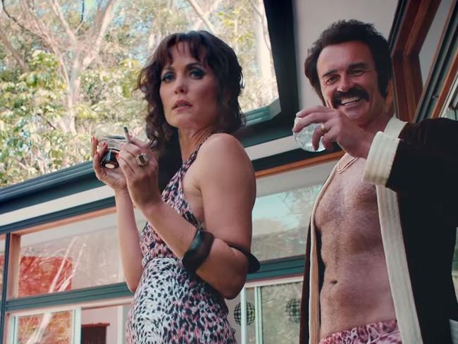 McMahon describes his Swinging Safari character Rick — pictured in the movie with Radha Mitchell as wife Jo — as “a pretty funky guy”. Picture: Becker Film Group