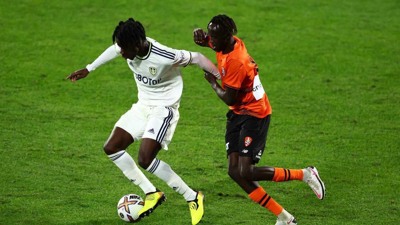 Leeds’ Darko Gyabi (left) battles with Brisbane Roar’s Abraham Majok. Picture: Chris Hyde/Getty Images