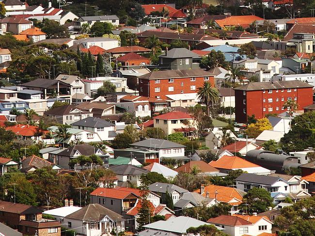 Various aerial photos over Sydney. The eastern suburbs with the CBD skyline in the background.