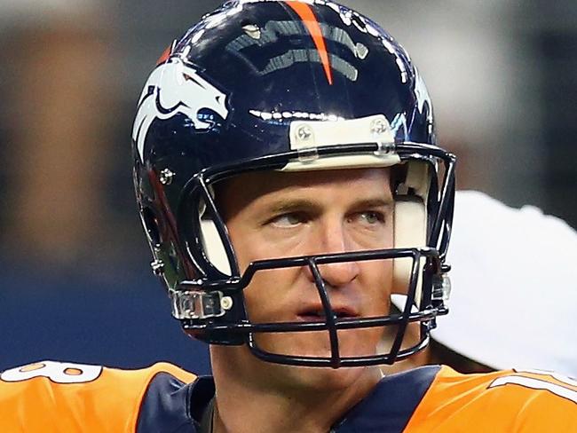 ARLINGTON, TX - AUGUST 28: Peyton Manning #18 of the Denver Broncos before a preseason game against the Dallas Cowboys at AT&T Stadium on August 28, 2014 in Arlington, Texas. Ronald Martinez/Getty Images/AFP == FOR NEWSPAPERS, INTERNET, TELCOS & TELEVISION USE ONLY ==