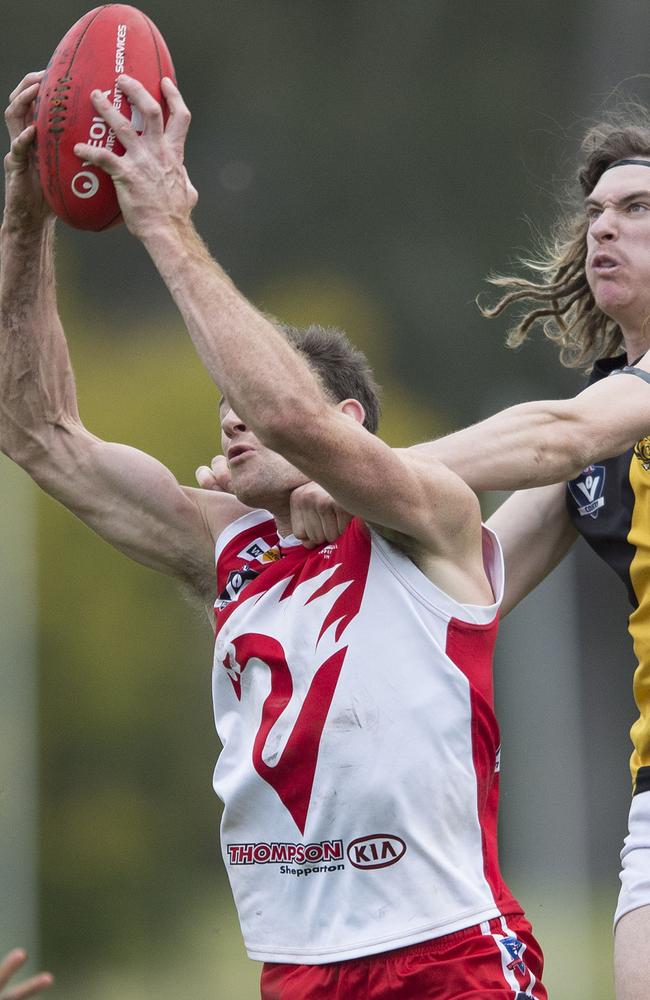 Justin Maddern marks for Shepparton swans.