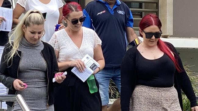 Holly Powers, Holly Green and Maddison Day leave court together earlier this year.