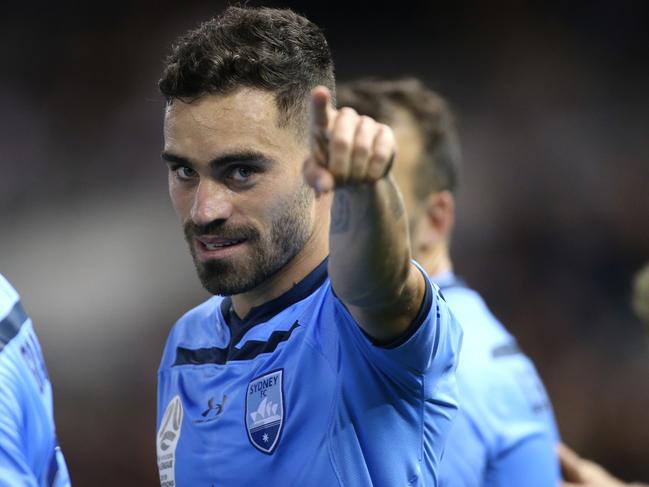 Anthony Caceres celebrates his second-half goal as the visitors took control.