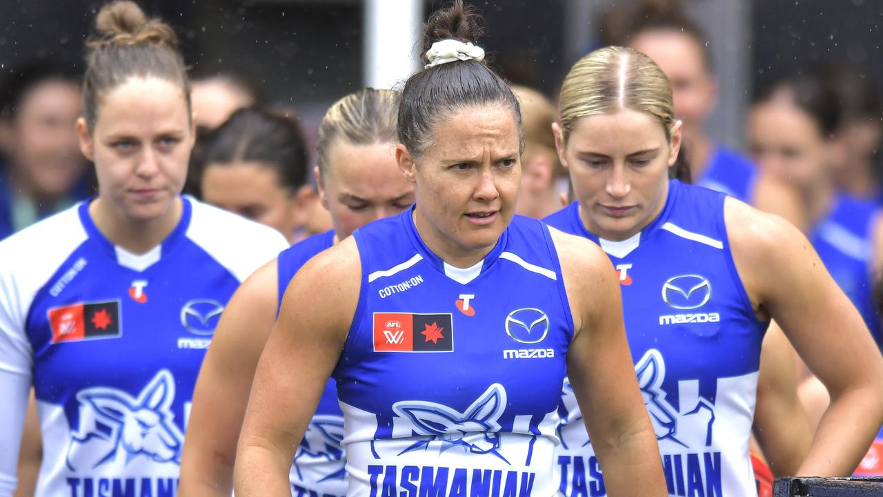 LAUNCESTON, AUSTRALIA - SEPTEMBER 29: Emma Kearney of the Kangaroos leads her team on to the field during the round five AFLW match between North Melbourne Kangaroos and Richmond Tigers at University of Tasmania Stadium, on September 29, 2024, in Launceston, Australia. (Photo by Simon Sturzaker/Getty Images)