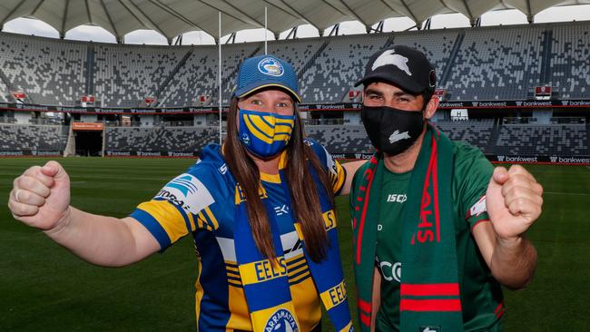 Fans are encouraged to wear a mask to and from Bankwest Stadium and when moving around inside the venue. Kirra Toogood and Jeremy Wilkinson have their facemasks ready. Picture: Emma Rothfield.