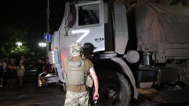 Members of the Wagner Group prepare to depart from the Southern Military District's headquarters and return to their base.