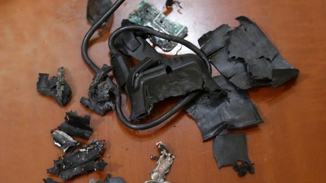 The remains of exploded pagers on display after hundreds of pagers used by Hezbollah members exploded across Lebanon on September 17. Picture: AFP