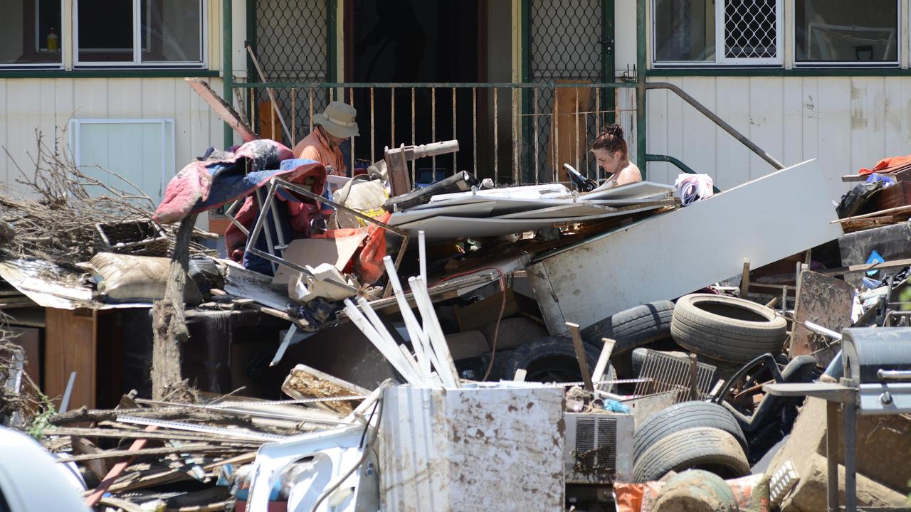 News Courier Mail, Bundaberg 4.2.2013, North Bundaberg streets are filled head high with rubbish from the flood affected houses. Photo Paul Beutel