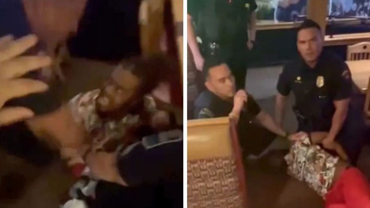 A US diner was tackled to the floor while holding a baby and then beaten by police officers in a case of mistaken identity. Pictures: Hal Mudge/Facebook