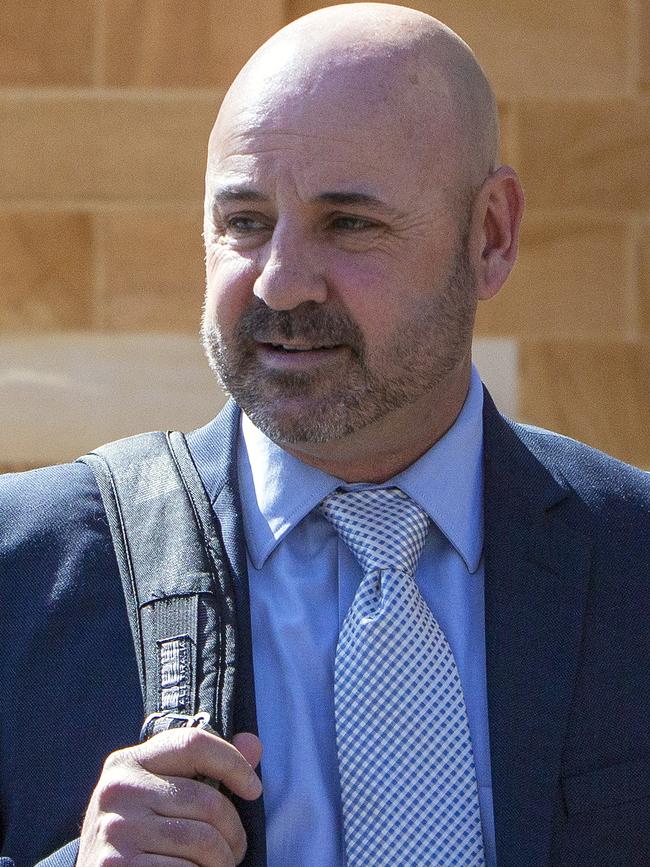 Matthew Lane leaves Adelaide Magistrates Court after pleading guilty to 11 counts of theft. Picture NCA NewsWire/Emma Brasier