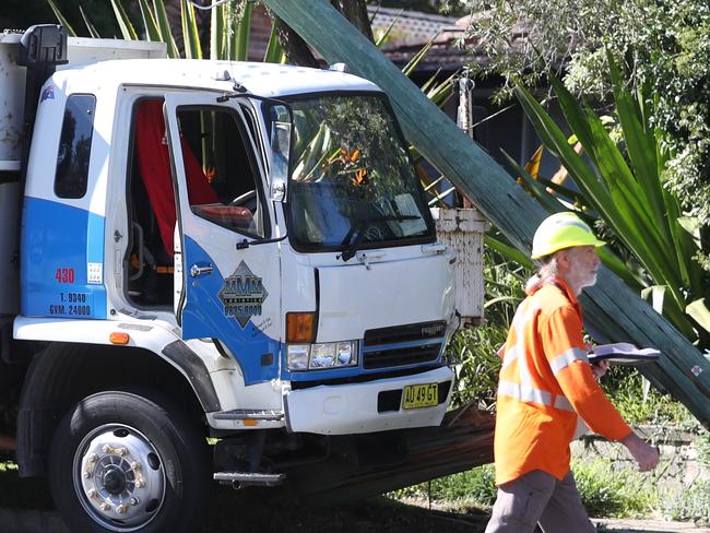 A truck ran into a power pole on Ryde rd West Pennant hills bringing down the pole and wires . 2 hours after the accident police rescued 7 kids from the Cocktoo family day care centre .picture John Grainger