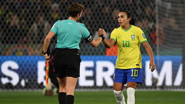 Brazil's forward Marta (R) came off the bench in the dying stages of the match. Picture: AFP.