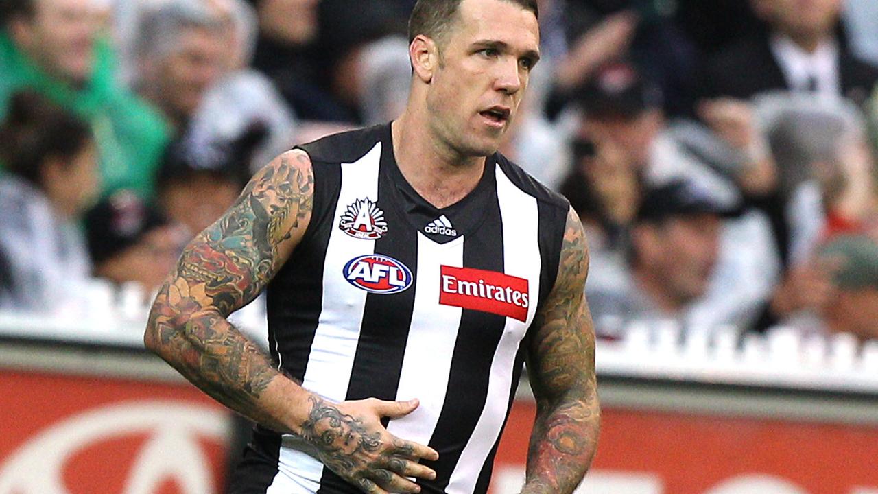 Dane Swan rubs his belly.