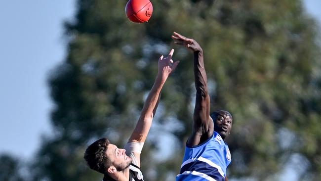 Parkside’s Bradley Graham and Point Cook Centrals’ Kwar Ater battled all day in the ruck. Picture: Andy Brownbill