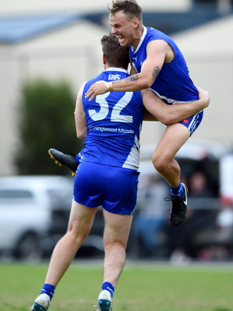 Eastern: Jayden Battaglene celebrates a goal by East Ringwood teammate Alexander McIntosh against Mooroolbark. Picture: Steve Tanner