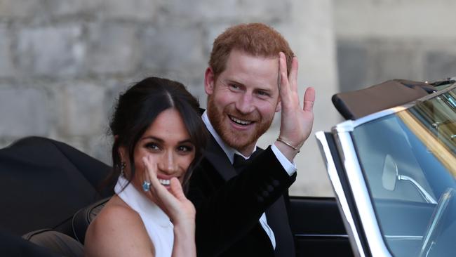 Prince Harry and Meghan with her aquamarine ring after their wedding in 2018. Picture: Steve Parsons – WPA Pool/Getty Images