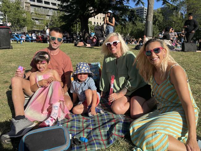 Hutchings Oâ&#128;&#153;Brien and the family at Flagstaff Gardens in the Melbourne CBD for the 2024 New Year's Eve fireworks. Picture: Himangi Singh