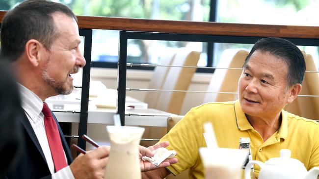 Member for Moreton Graham Perrett and business owner Steve Hsu want the community to know there’s nothing to worry about in Sunnybank. Picture: John Gass/AAP