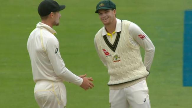 Peter Handscomb speaks to Cameron Bancroft to alert him he's been caught cheating.