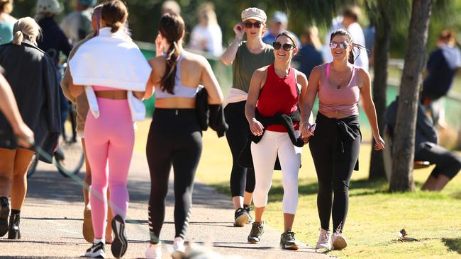 People walk along Burleigh Heads foreshore on Saturday morning. Picture: Getty Images