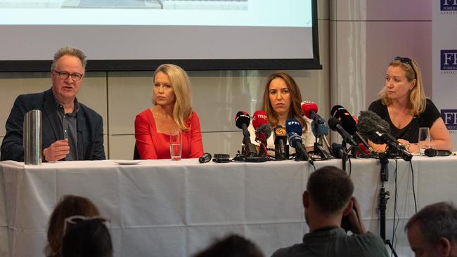 Stella Moris, Julian Assange's wife listens as she attends a press conference with Tim Dawson, executive member of the National Union of Journalists (L) and Jen Robinson, Assange's legal advisor