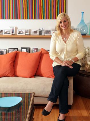 Johanna Griggs with the Greeny Purvis painting in the background. Picture: John Fotiadis