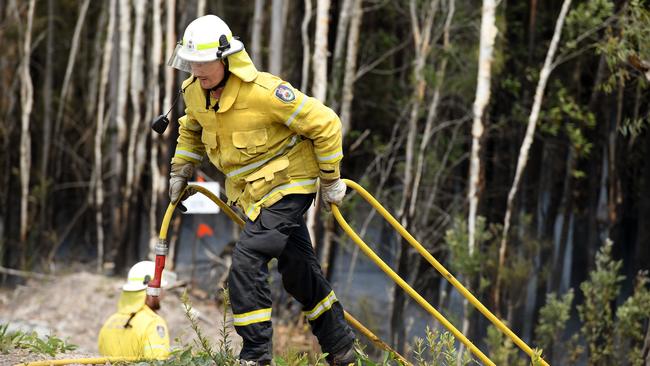 Rural Fire Service deal with a blaze alongside the highway at New Italy.