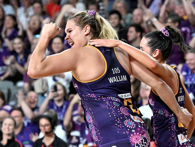 BRISBANE, AUSTRALIA - JUNE 04: Donnell Wallam and Emily Moore of the Firebirds celebrate victory during the round 12 Super Netball match between Queensland Firebirds and Melbourne Vixens at Nissan Arena, on June 04, 2023, in Brisbane, Australia. (Photo by Bradley Kanaris/Getty Images)