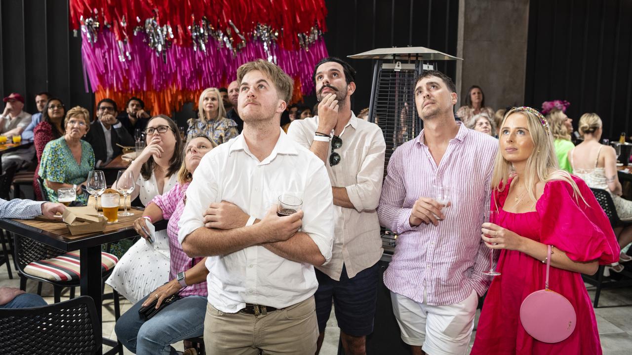 Watching the Melbourne Cup race are (from left) Riley Wockner, Callum Hart, Chris Hall and Holly Walker at The Rock Melbourne Cup party, Tuesday, November 1, 2022. Picture: Kevin Farmer