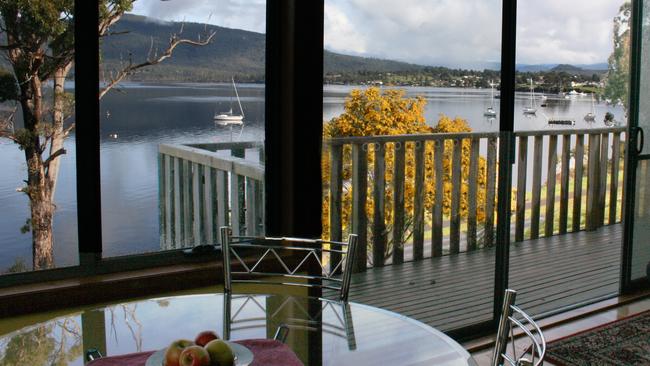 The gorgeous mountain and bay views can be enjoyed from the deck or inside the cottages at Driftwood.