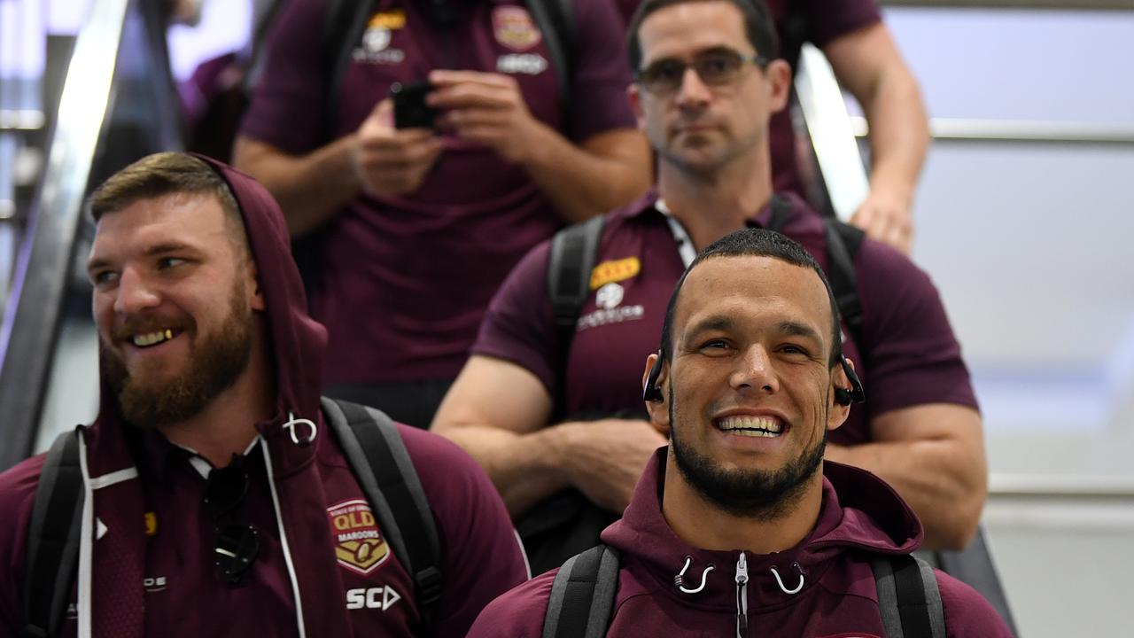 Queensland Maroons player Will Chambers (right) arrives in Sydney with teammate Josh McGuire