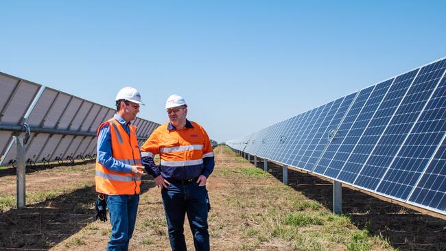 SITE INSPECTION: Adani CEO Lucas Dow and Adani Renewables Manager Ian Sedgman visiting the Rugby Run Solar Farm visit during the mechanical completion event in November last year.